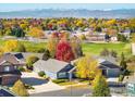 Picturesque neighborhood with mountain views and mature trees at 1403 Bluemoon Dr, Longmont, CO 80504