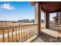 Inviting outdoor porch offers serene views of the green space at 2342 Irons St, Erie, CO 80516