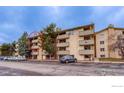 Three story condo building with private balconies, landscaping and parking at 3035 Oneal Pkwy # 36, Boulder, CO 80301