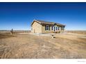 View of home and surroundings with bird bath at 47705 Private Road 19 Rd, Elizabeth, CO 80107