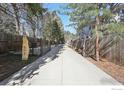 Long driveway to the house with a stone with numbers on it at 503 Kalmia Ave, Boulder, CO 80304