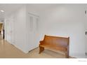 Hallway features a closet, bench, and tile floors at 449 Wright St # 6, Lakewood, CO 80228