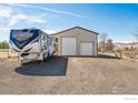 Property boasts an oversized garage with RV Parking at 4900 Beverly Dr, Berthoud, CO 80513