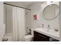 Bathroom with a shower and white subway tile at 1031 Portland Pl # 4, Boulder, CO 80304