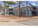 Apartment complex features steel and wood stairwells leading to each level with native landscape rock at 1534 Bradley Dr, Boulder, CO 80305