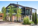 Modern home with an attractive facade, large windows, and professional landscaping at 2586 3Rd St, Boulder, CO 80304