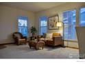 Cozy living room filled with natural light, featuring comfortable seating and stylish decor at 4315 Bella Vista Dr, Longmont, CO 80503