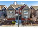 Charming two-story home with a landscaped front yard and colorful exterior at 8146 E 53Rd Dr, Denver, CO 80238