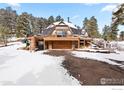 A view of the home and deck with its unique architecture at 11186 Circle Dr, Golden, CO 80403