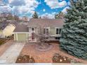 Beautiful aerial view of the home showcasing its landscaped yard, and neighborhood at 138 S Washington Ave, Louisville, CO 80027