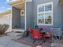 Relaxing patio area with outdoor seating, perfect for enjoying the fresh air and tranquil surroundings at 588 Beauprez Ave, Lafayette, CO 80026