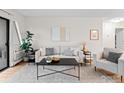 Inviting living room featuring neutral tones, stylish decor, and ample natural light at 3120 Corona Trl # 301, Boulder, CO 80301