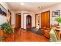 Bright foyer with tile and wood flooring, closet, and natural light at 3335 Darley Ave, Boulder, CO 80305