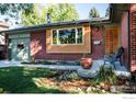 Inviting front porch with seating and lush landscaping, enhancing curb appeal at 3335 Darley Ave, Boulder, CO 80305