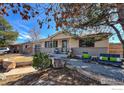 Charming single-story home offers a welcoming exterior, perfect for relaxing outdoors at 4360 Ludlow St, Boulder, CO 80305