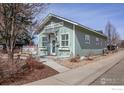 Stylish home with a well-kept exterior, appealing landscaping, and a welcoming facade at 954 11Th Ave, Longmont, CO 80501