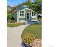Charming home with well-manicured lawn, walkway, and lovely curb appeal at 954 11Th Ave, Longmont, CO 80501