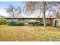 Charming home with mature trees and greenery, showcasing a welcoming and well-maintained front yard at 2550 Linden Ave, Boulder, CO 80304