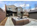 Outdoor patio featuring a seating area and fire pit, perfect for outdoor relaxation and entertaining at 3865 Newport Ln, Boulder, CO 80304