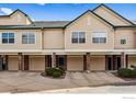 Attractive townhouse featuring a multi-car garage, neutral siding and trim, and well-maintained landscaping at 2192 Eagle Ave, Superior, CO 80027