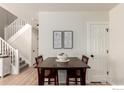 Dining area adjacent to the staircase at 2426 W 82Nd Pl # D, Westminster, CO 80031