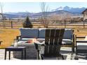 Inviting outdoor firepit area with mountain views and comfortable seating at 3210 Mallard Creek Rd, Berthoud, CO 80513