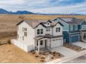 Beautiful two-story home featuring a modern farmhouse design and stunning mountain views at 153 Mohawk Cir, Superior, CO 80027