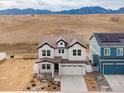 Beautiful two-story home featuring a modern farmhouse design and stunning mountain views at 153 Mohawk Cir, Superior, CO 80027