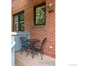 Cozy porch with a table and chairs for relaxing outdoors at 3210 Iron Forge Pl # 103, Boulder, CO 80301