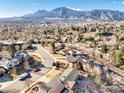 Aerial view of neighborhood with beautiful homes and stunning mountain views at 2003 Balsam Dr, Boulder, CO 80304