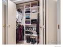 Organized closet with shelving and hanging space for clothes, shoes, and accessories at 1513 48Th St, Boulder, CO 80303