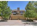 Well-maintained townhouse with attached garages and mature landscaping at 2954 Kalmia Ave # 34, Boulder, CO 80301