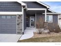 Close-up of the front porch and home entrance at 1525 Waterman St, Berthoud, CO 80513