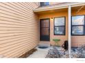 A welcoming covered front entry with stylish decor at 3076 Fulton Cir, Boulder, CO 80301