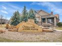 Community sign 'Overlook at Steel Ranch' with well-maintained landscaping and exterior views at 1856 Kalel Ln, Louisville, CO 80027