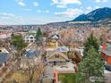 Stunning aerial view of the property showcasing the spacious backyard and mountain view at 1013 Mapleton Ave, Boulder, CO 80304