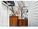 Exterior shot from private wood balcony showing entry door and view of surrounding neighborhood at 1111 Maxwell Ave # 231, Boulder, CO 80304