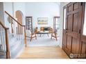 Bright living room with hardwood floors, modern decor, and an inviting open layout at 1069 Monarch Way, Superior, CO 80027