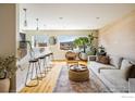 Bright living room with stylish furniture, a textured rug, and views at 1201 Balsam Ave # 302, Boulder, CO 80304