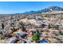 Lovely home outlined in red, nestled in a neighborhood with mountain views and convenient access to local amenities at 3682 Chase Ct, Boulder, CO 80305