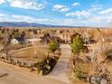 Beautiful aerial view of home showing the surrounding landscape and mountain views at 4963 Kelso Rd, Boulder, CO 80301