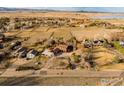 Stunning aerial shot of home situated on acreage in a serene, rural setting at 4963 Kelso Rd, Boulder, CO 80301