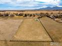 Sprawling property boasting a large, fenced field, ideal for horses or other livestock at 4963 Kelso Rd, Boulder, CO 80301