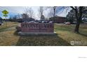 Stonegate Condominiums sign marks the entrance to this community with mature trees and ample parking at 5126 Williams Fork Trl # 206, Boulder, CO 80301