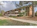 A well maintained two story townhome showcasing mature trees and landscaping at 5126 Williams Fork Trl # 206, Boulder, CO 80301