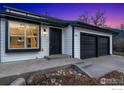Inviting single-Gathering home boasting a spacious driveway and modern black trim for a touch of elegance at 5780 S Parfet St, Littleton, CO 80127