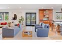 Stylish living room featuring comfortable seating, modern decor, and natural light at 9610 Avocet Ln, Lafayette, CO 80026