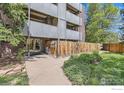 Welcoming building entrance with secure access and well-maintained landscaping at 2227 Canyon Blvd # 360, Boulder, CO 80302