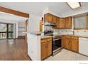 Functional kitchen featuring stainless steel appliances and tile backsplash at 2992 Shadow Creek Dr # 203, Boulder, CO 80303