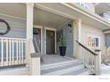 Charming front porch features a well-maintained entrance with neutral tones and tidy landscaping at 1944 Arapahoe Ave # C, Boulder, CO 80302